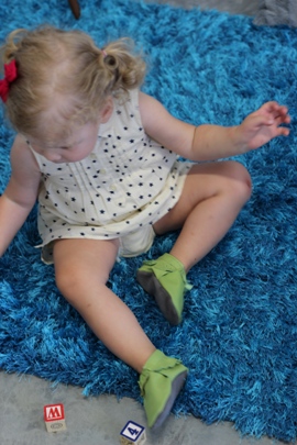 toddler wearing mally mocs leather baby moccasins